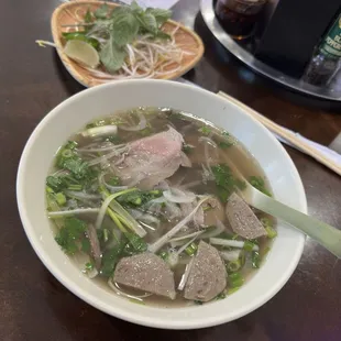 House pho with sliced beef brisket and meatballs
