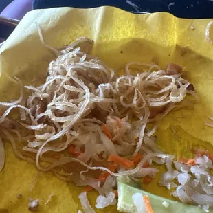 The Vietnamese sandwiches have this very elastic strings they claim to be shaved pork skin.