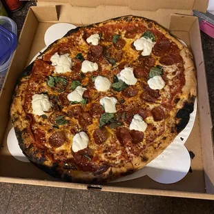 PUTTIN&apos; ON THE RITZ - COAL FIRED PIZZA