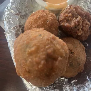 The Boudin balls were slamming I say go there and they&apos;re very good. The sauces good the atmospheres is beautiful a nice cozy place