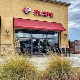 Front of New Love Sushi on Mt. Vernon next to Sizzler.