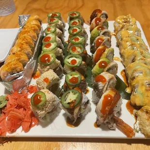 Basked salmon, Las Vegas, super dragon, and fire and other spicy tuna roll