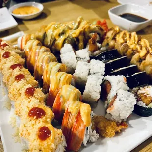 Ex boyfriend roll, new twister roll, tuna, shrimp tempura, friend tempura roll, can&apos;t recall last one