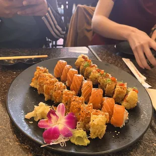 a plate of sushi on a table