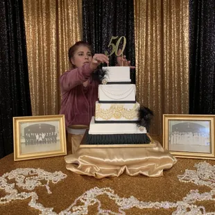 Me putting the final touches on this great gatsby cake.