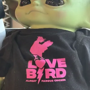 Grogu wearing love bird merchandise