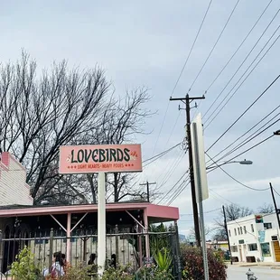a car parked in front of a restaurant