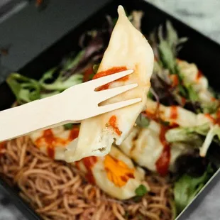 a close up of a meal in a box