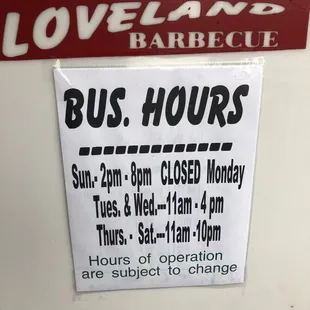 a bus hours sign