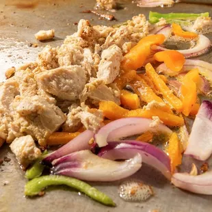 Sautéed Grilled chicken peppers and onions