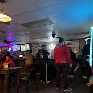 people sitting at the bar