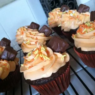 chocolate cupcakes with frosting and sprinkles