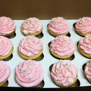 a dozen cupcakes in a box