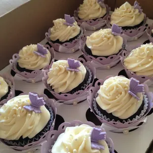 Lavender Velvet cupcakes with cream cheese frosting along with Lovely's custom wrappers