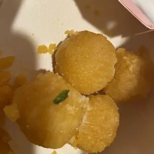 Check the lines on the laddus, they took the paper off