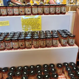 a shelf full of jars