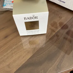 This box should be wrapped in plastic which is folded and sealed on the sides. No wrapping