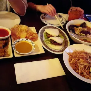 Malay spring rolls, roti canai, BBQ char siu buns, mixed seafood laksa noodles, chicken pad thai