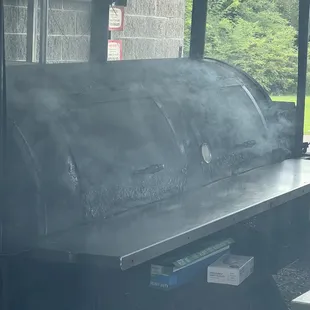 The source of the heavenly aroma and flavor that is The Perfect BBQ.  You can't miss seeing the billowing smoke!