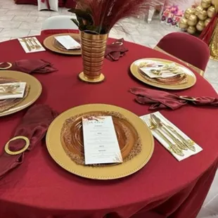 Event Elegant Table with Rich Gold and Burgundy Set Up