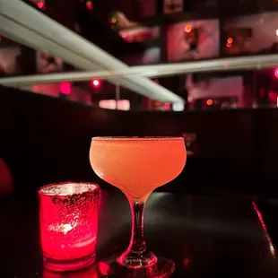 Astral Plane cocktail with gin, lemon, herd de Provence syrup, &amp; champagne