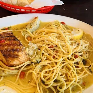 This grilled salmon Over Linguini in a lemon brown sauce is the best