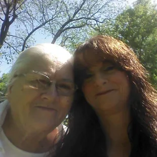 a man and a woman posing for a picture