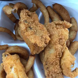 Whiting small size plate. Flavorful, but I wish I hadn't seen the cooks frying fish without a mask!