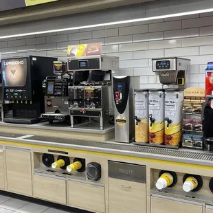 a row of coffee machines