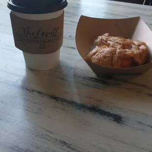 My delicious coffee and breakfast sandwich.