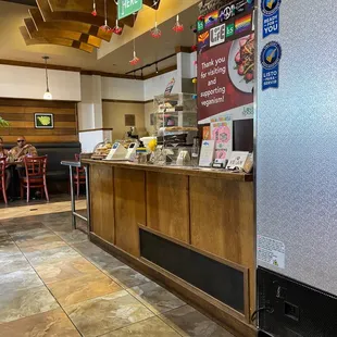 a counter with a variety of food items