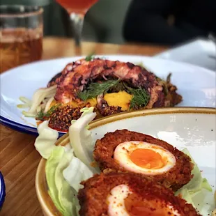 Front to back: The Egg, Grilled Octopus, the &quot;Billy Jack&quot; and &quot;Crikey Carumba&quot;
