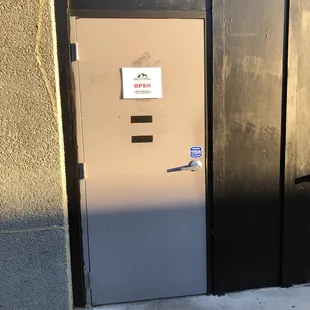 Entrance. Located in the parking lot.