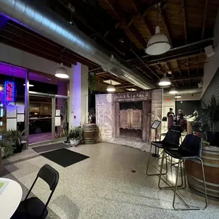 a large room with tables and chairs