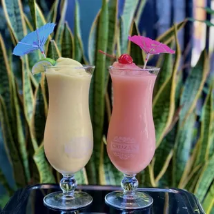 two cocktails on a table