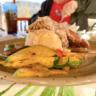 Ribeye with horseradish sauce and side veggies.