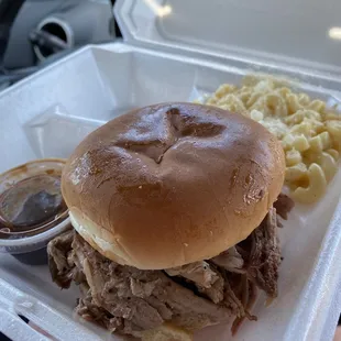 Pulled pork sandwich with side of Mac n cheese.