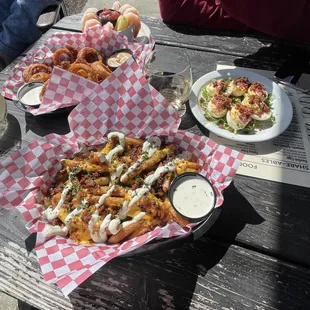 Shrimp cocktail, Onion rings, Smoked Deviled Eggs, supreme fries.