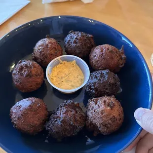 Hushpuppies. Half of them burnt.
