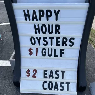 happy hour oysters sign