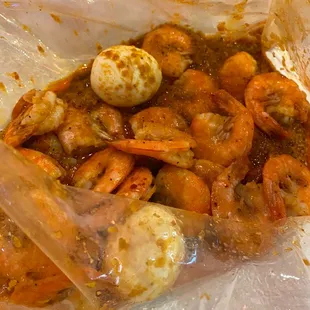 a shrimp dish in a plastic bag