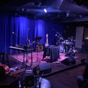 a stage set up with musical equipment