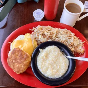 Country ham biscuit with eggs &amp; cheese, buttered grits, hash browns, and hot coffee