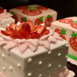 a variety of decorated cakes