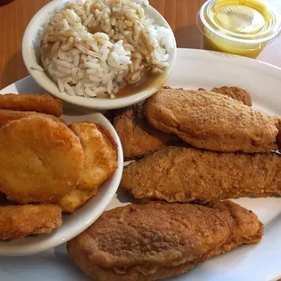 Lunch plate: chicken fingers with fried squash and rice. Just so so.