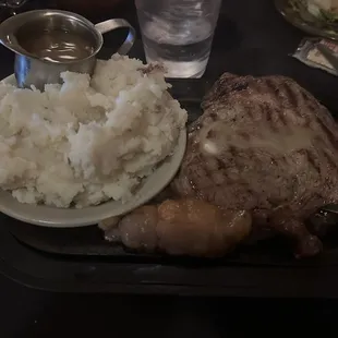 Ribeye with mashed potatoes.