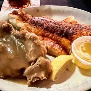 a plate of food and a drink