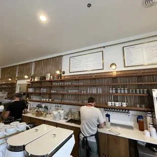 two men working in a coffee shop