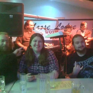 Us listening to the band play.