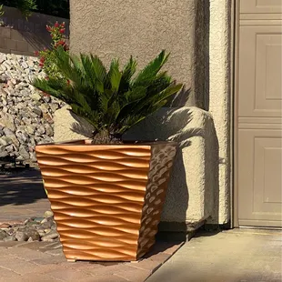 Concrete planter. Originally white and painted metallic copper per Jessica&apos;s recommendation.